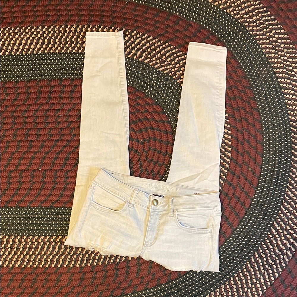 American Eagle Super Stretch Super Low Rise Light Wash Ripped Jean Size 6‎